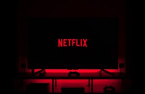 flat screen television displaying Netflix logo